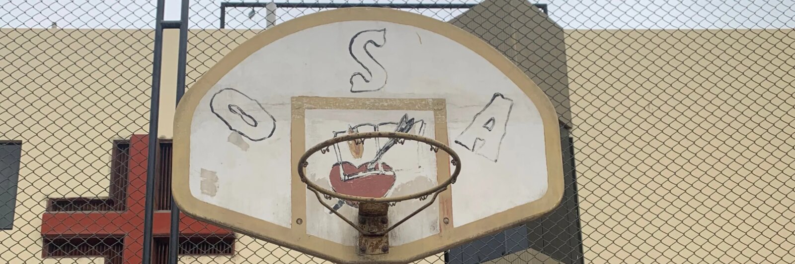 A weathered basketball hoop on the South Side of Chicago